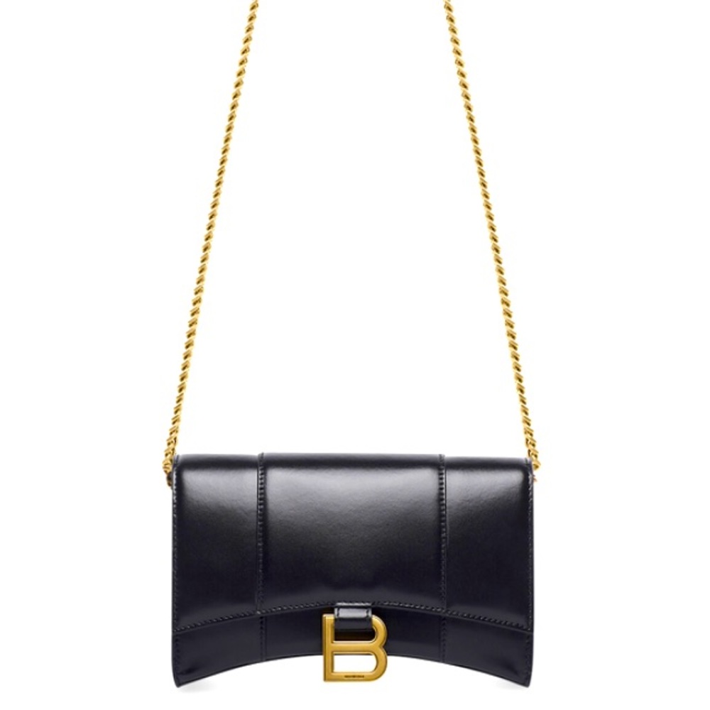 Balenciaga hourglass bag with gold chain.